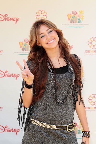 78284772---miley_cyrus_peace.jpg